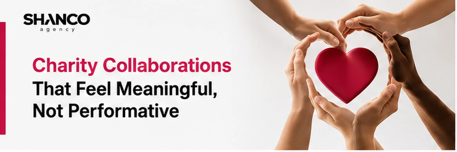 Diverse hands forming a heart around a red heart for meaningful charity collaborations by SHANCO Agency